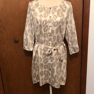 Lightweight, knee-length dress by Express with soft patterns. Size M